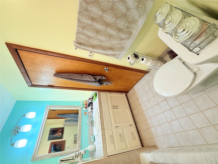 Bathroom with toilet and vanity