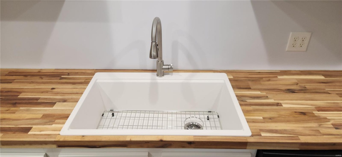Granite sink with pull down faucet