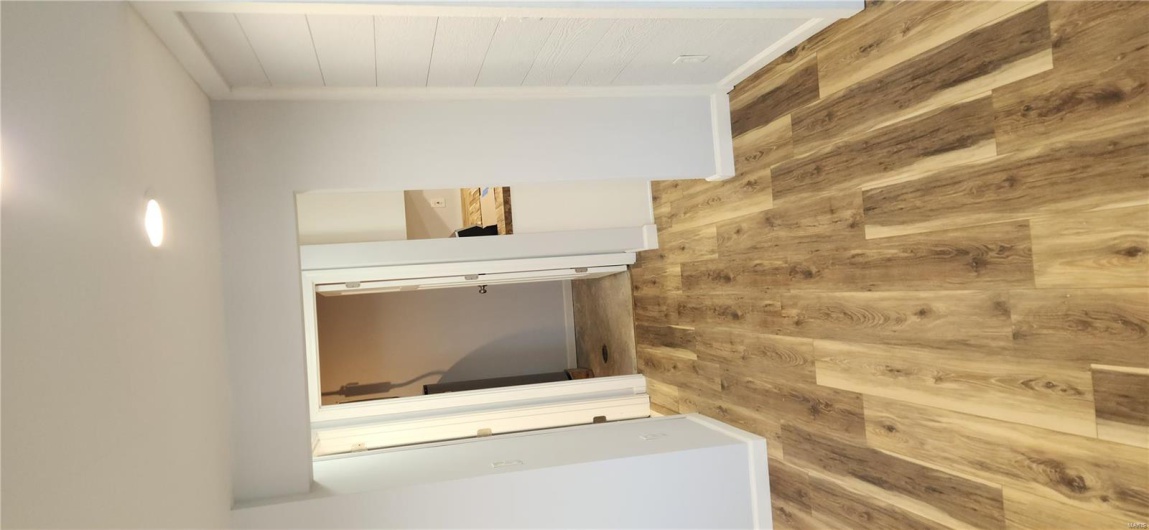 Hallway to kitchen/utility room main level