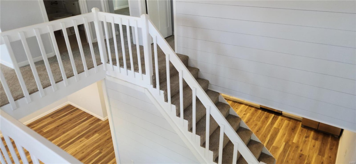Staircase looking down from upper area