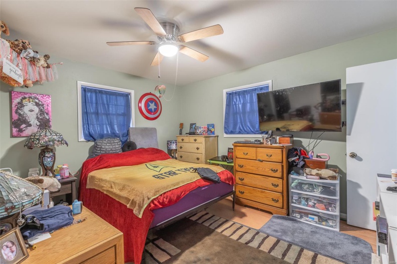 Bedroom featuring ceiling fan