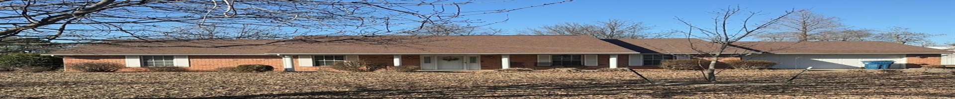 Residential For Sale Ranch-style home with an attached garage, a shingled roof, and brick siding