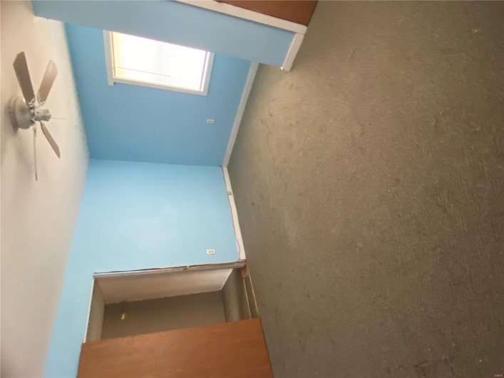 Unfurnished bedroom featuring ceiling fan, baseboards, and carpet floors