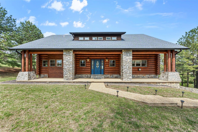 Front of Rocky Mtn Log Home with Expansive Covered Front Porch