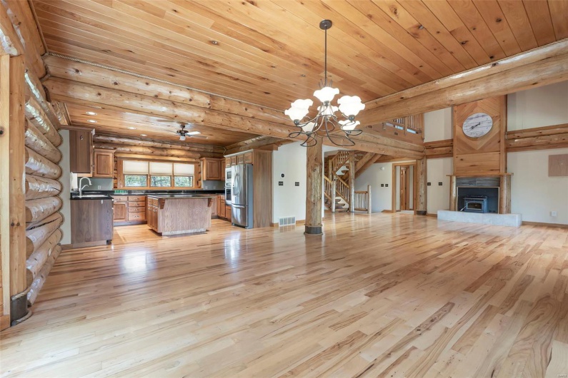 Open Floor Dining with a View, Situated Between Kitchen and French Door Access to Rear Balcony Deck