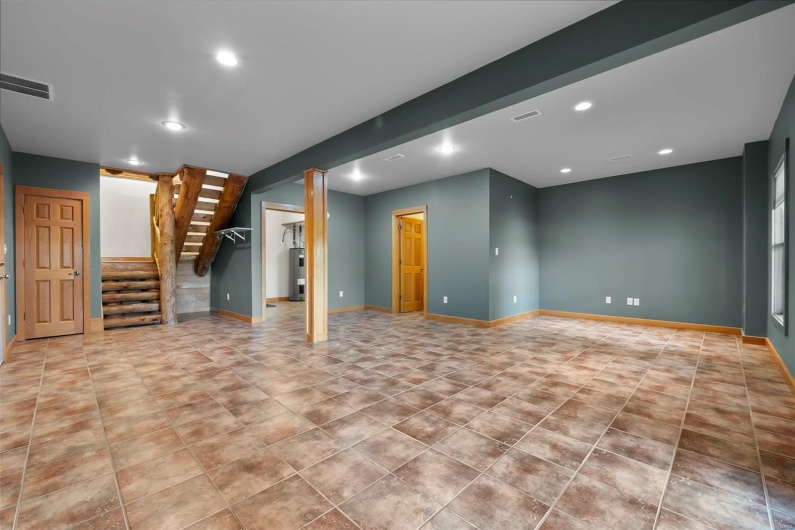 Lower Level Family/Rec Room with Full Bath Access Could Easily Be Partitioned for Multiple Uses