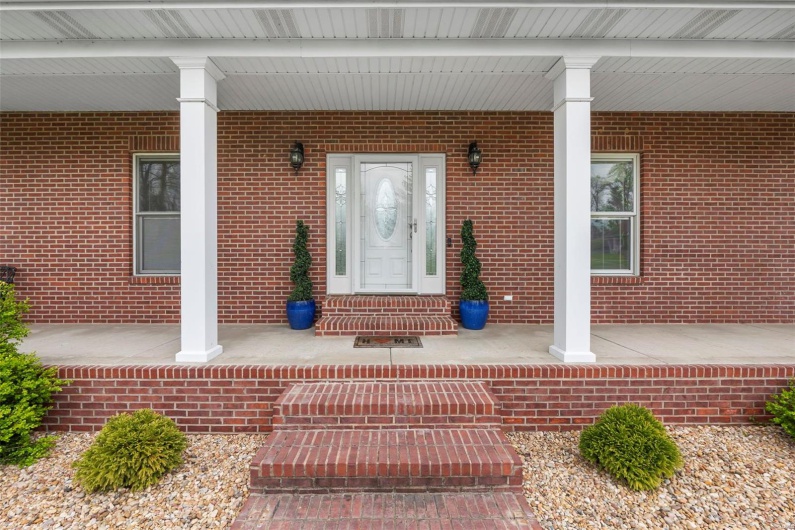 From Sidewalk to Expansive Covered Front Porch