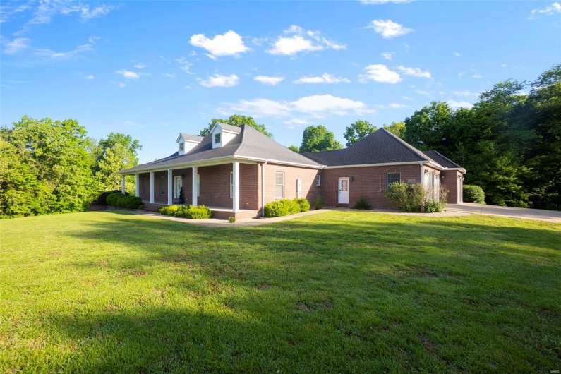 South View of Custom Brick Home with Pool & Lake Access on 5.4 Acres
