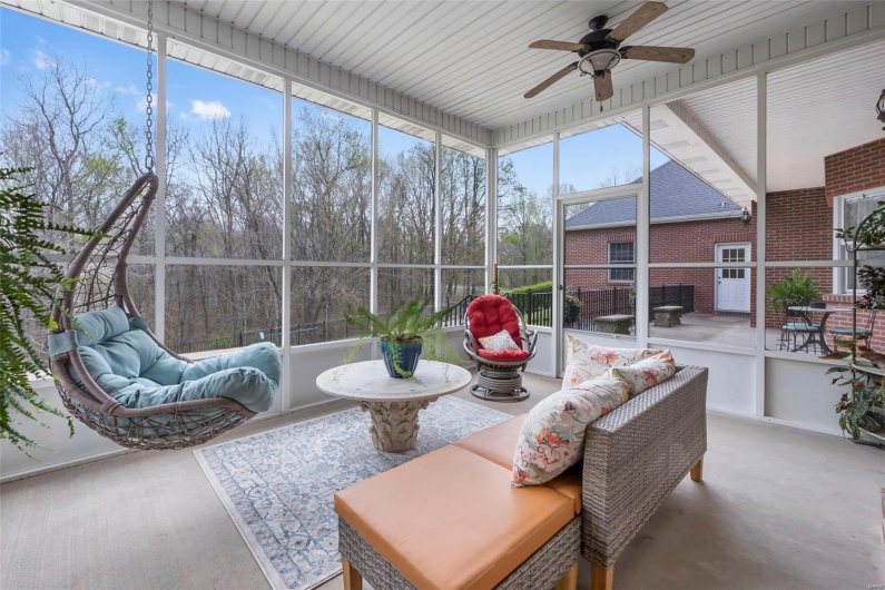 Sunroom Overlooking Backyard and Balcony Patio