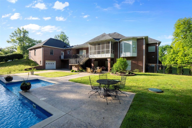 Private Backyard Features Jetted Inground Pool on Spacious Patio and Concrete Deck/Screened-Patio
