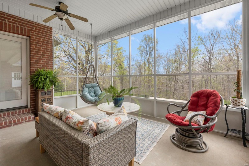 Sunroom Overlooking  Backyard, Accessible from Primary Suite & Living Room