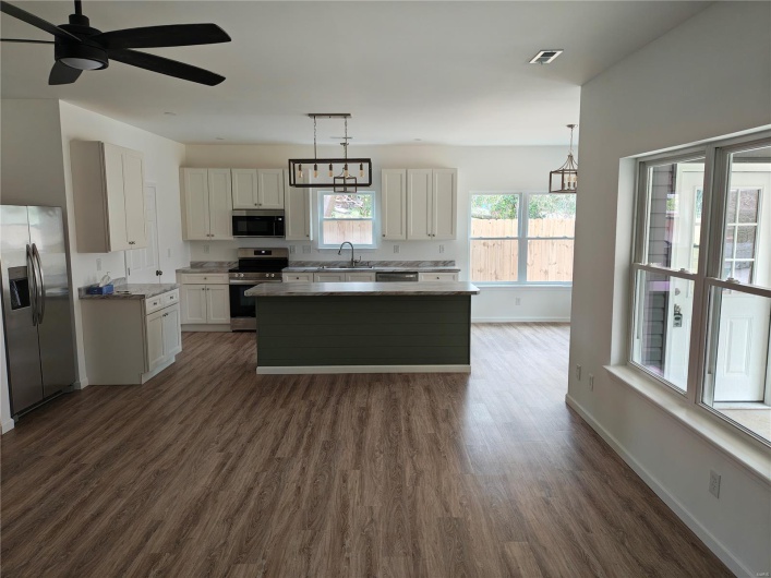 Open Spacious/center island looking from great room into kitchen