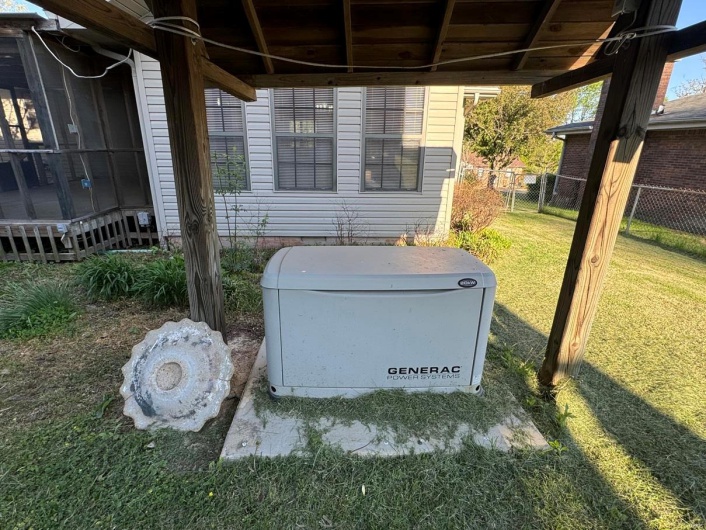 Exterior details featuring fence and a power unit