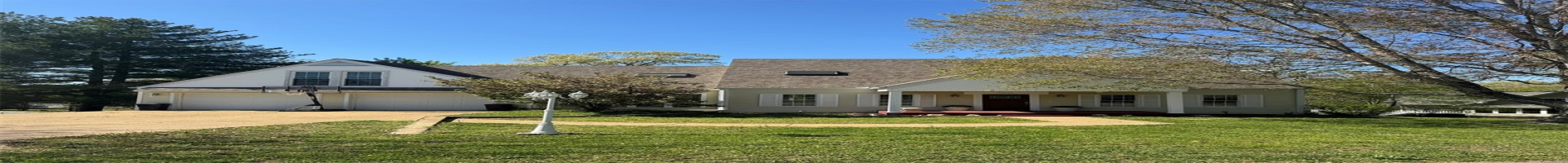 Residential For Sale View of front facade featuring concrete driveway, a front yard, a garage, a shingled roof, and covered porch