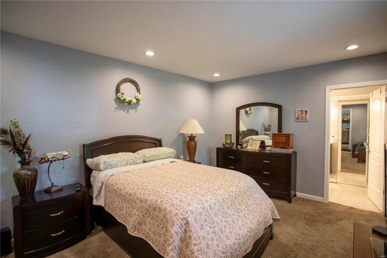 Carpeted bedroom featuring recessed lighting and baseboards