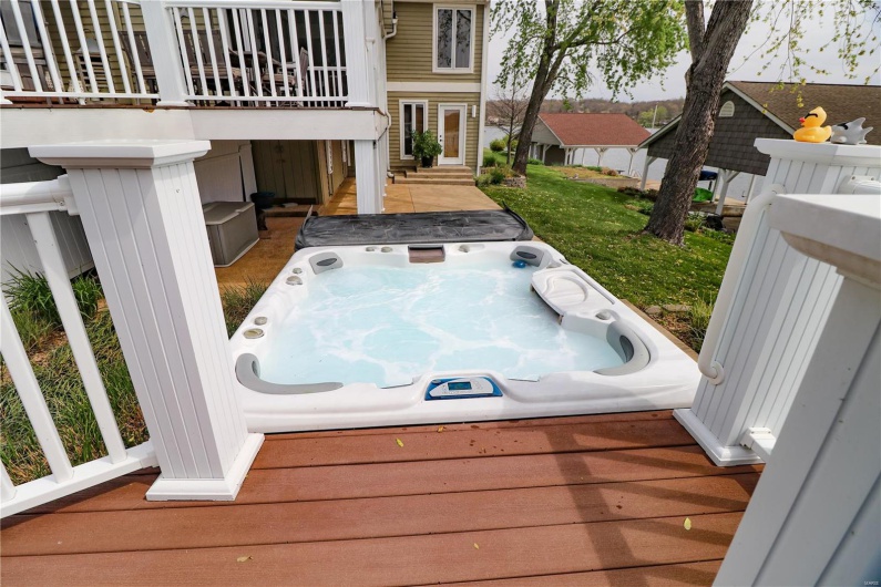 Deck featuring a hot tub