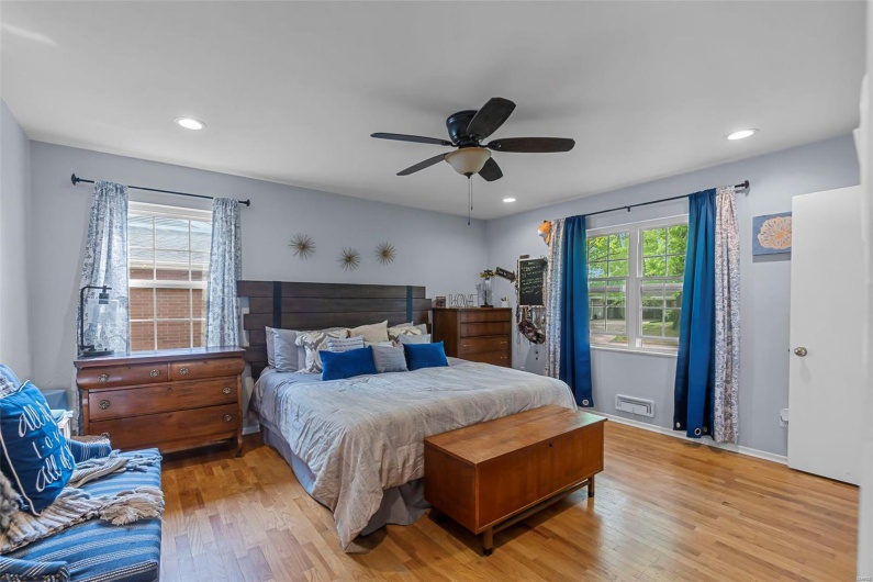Bedroom with ceiling fan, recessed lighting, and light wood-type flooring