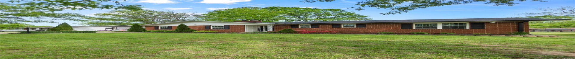 Residential For Sale Single story home featuring a chimney, a front lawn, and brick siding