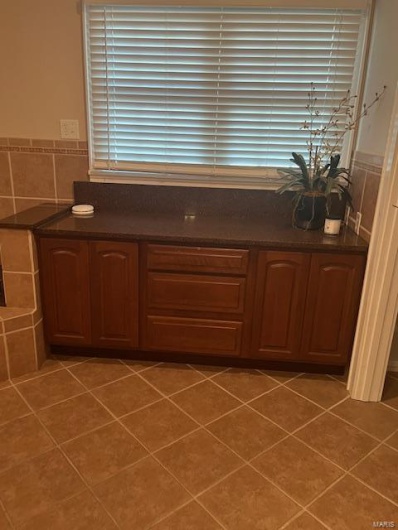 Bathroom featuring tile patterned floors