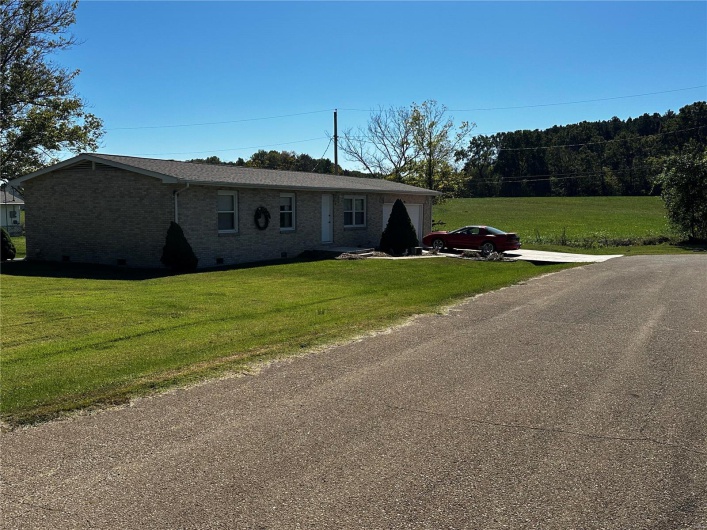 View of front facade with a front lawn