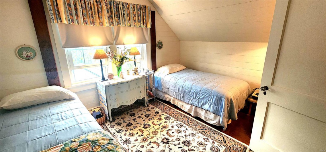 Upstairs Bedroom with lofted ceiling