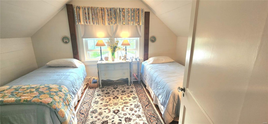 Upstairs Bedroom with vaulted ceiling