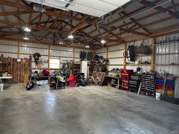 Garage featuring a workshop area