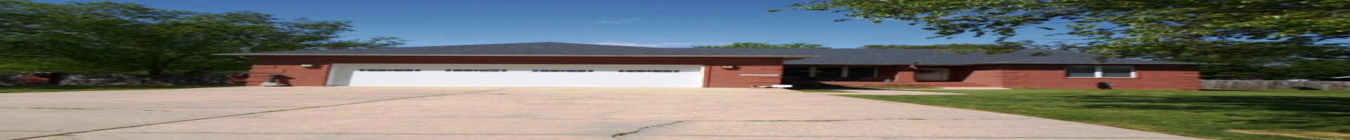 Residential For Sale Single story home with fence, concrete driveway, an attached garage, brick siding, and a front yard