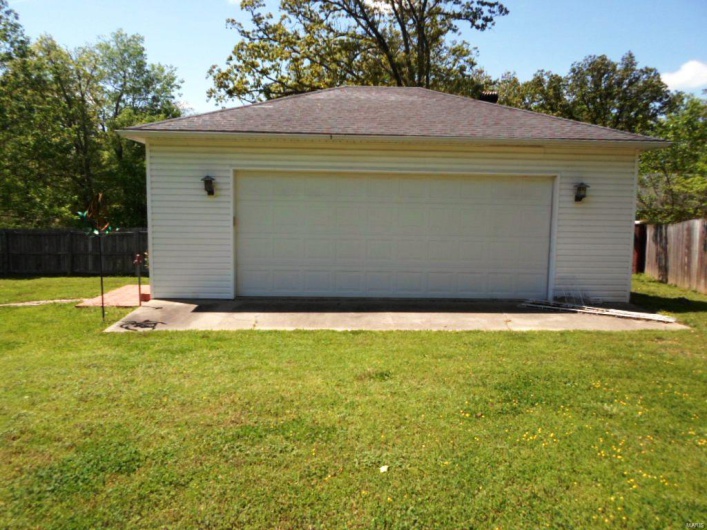 Detached garage with fence