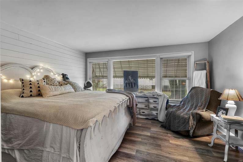 Bedroom with wood finished floors