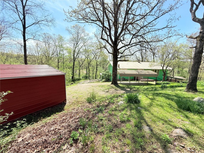 View of yard with an outdoor structure