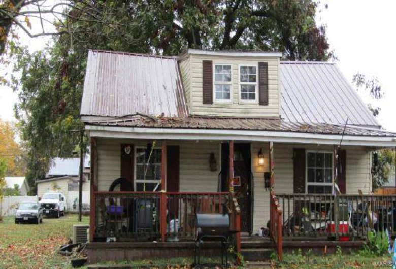 View of front of house with covered porch