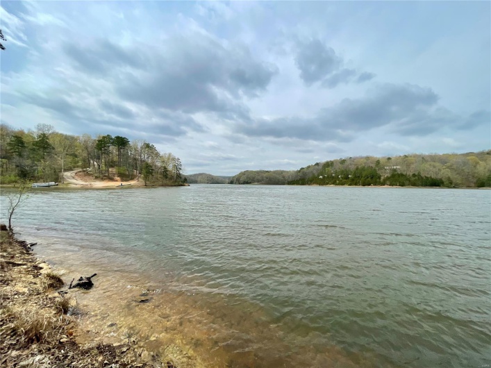 Property view of water with a forest view