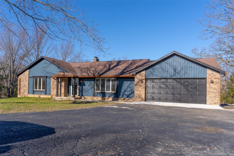 View of front of house featuring a garage