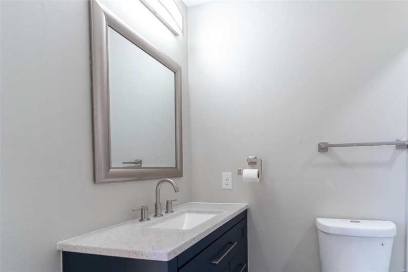 Bathroom with vanity and toilet