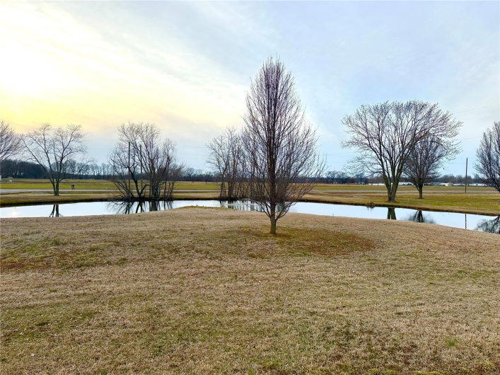 View of yard with a water view