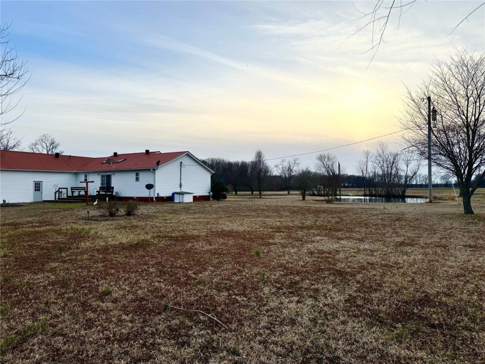 View of yard with a water view