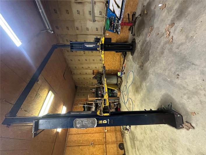 Garage featuring a workshop area