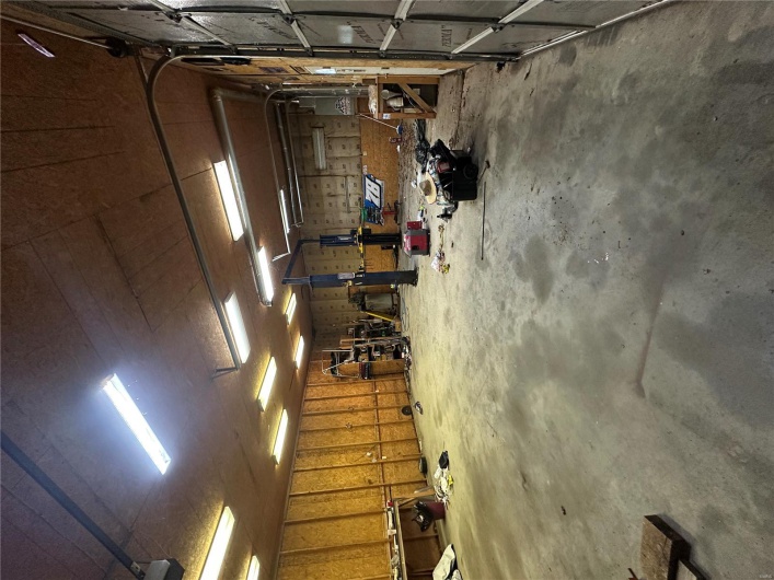 Garage featuring a workshop area
