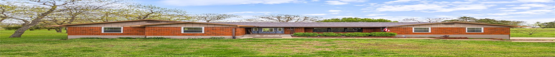 Residential For Sale Ranch-style home featuring a front lawn, brick siding, and roof with shingles
