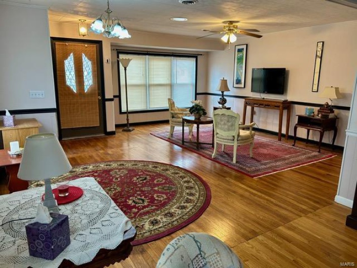 Front door and entrance to living room