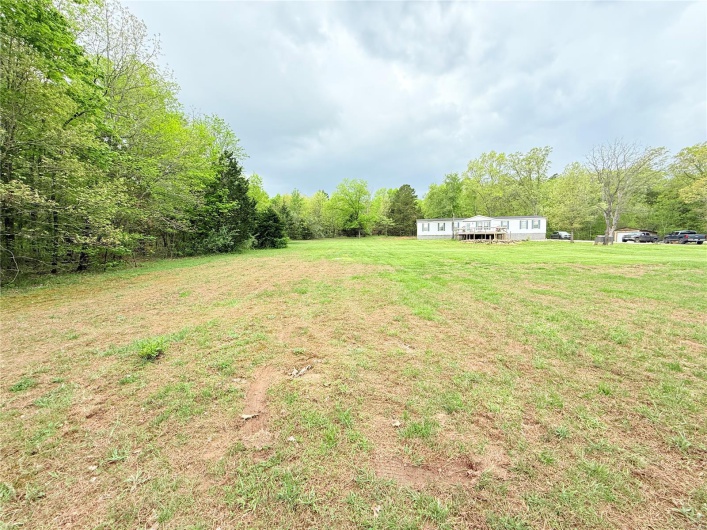 View of yard with a forest view