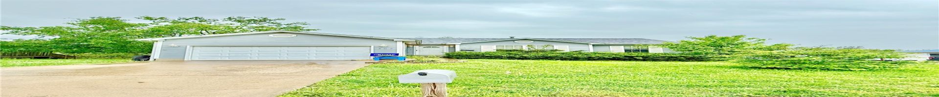 Residential For Sale Ranch-style house with concrete driveway, a front lawn, and a garage