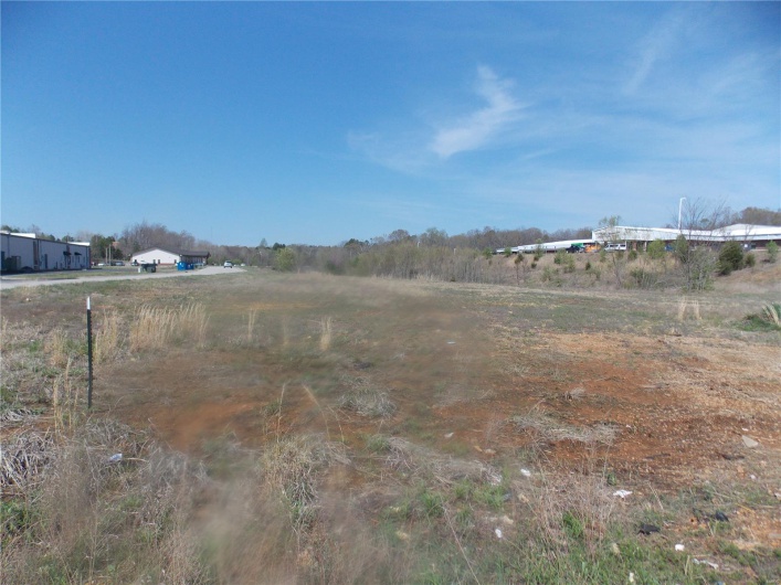 View of yard with a rural view
