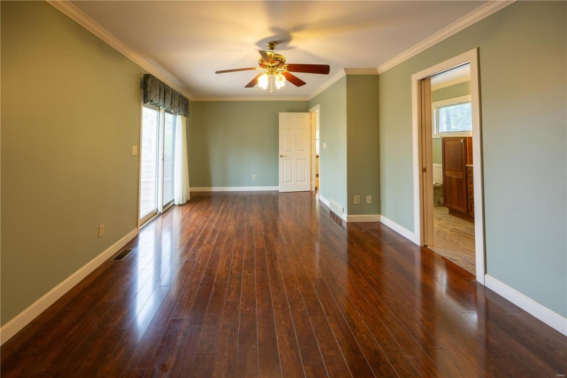 Primary bedroom suite is privately located on the 2nd floor.