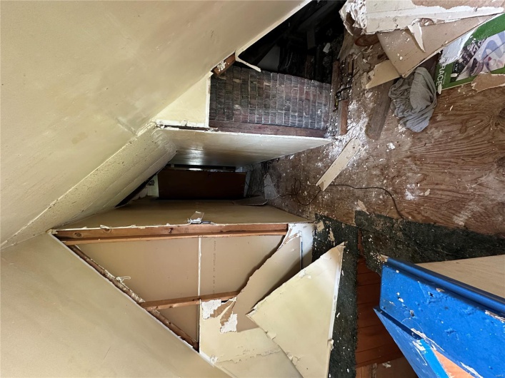 Additional living space featuring lofted ceiling