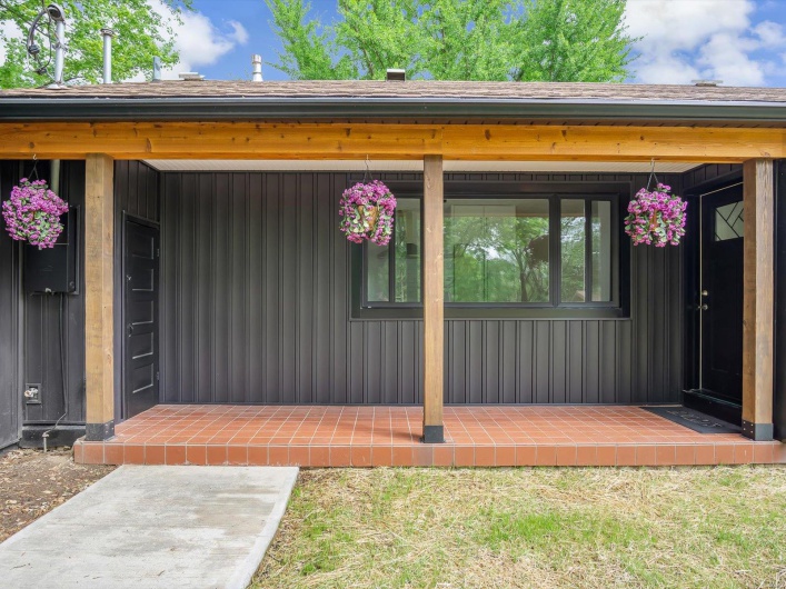 Entrance to property featuring board and batten siding