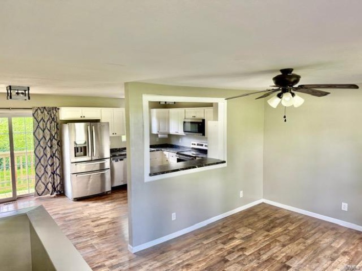 living room w/ kitchen view