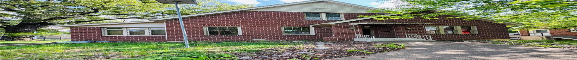 Residential For Sale View of front of home featuring brick siding