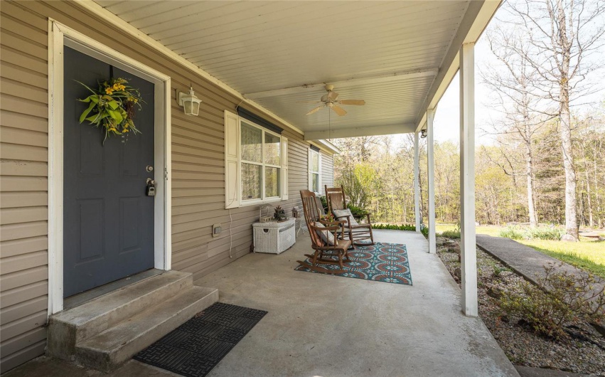 View of patio with a porch, ceiling fan, and entry steps